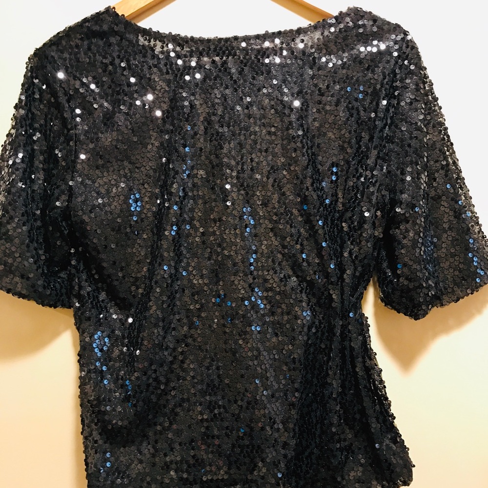 Ladies black sequin top.. NWOT